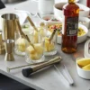 Coffret cocktail Point Virgule 4 accessoires en inox doré