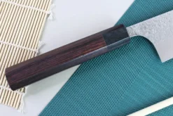Couteau de chef japonais artisanal martelé Yu Kurosaki Shizuku 24cm acier SG2