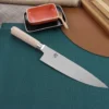 Couteau de chef japonais Kai Shun Classic White damas 33 couches 20cm