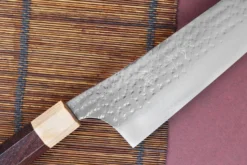 Couteau de chef kiritsuke japonais artisanal martelé Yu Kurosaki senko 24cm acier SG2