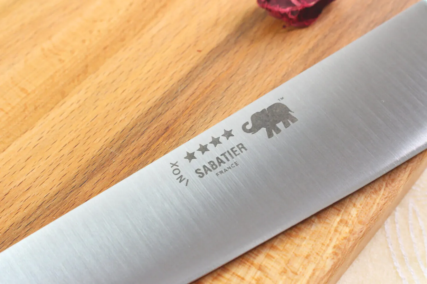 Couteau de chef Sabatier Éléphant Idéal Forgé 20cm manche nylon noir