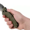 Couteau pliant Benchmade Turret Black 980SBK lame noire semi-dentée manche G10 vert olive 12cm