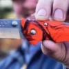 Couteau pliant BUCK BANTAM 0285CMS9 manche orange camo 11cm