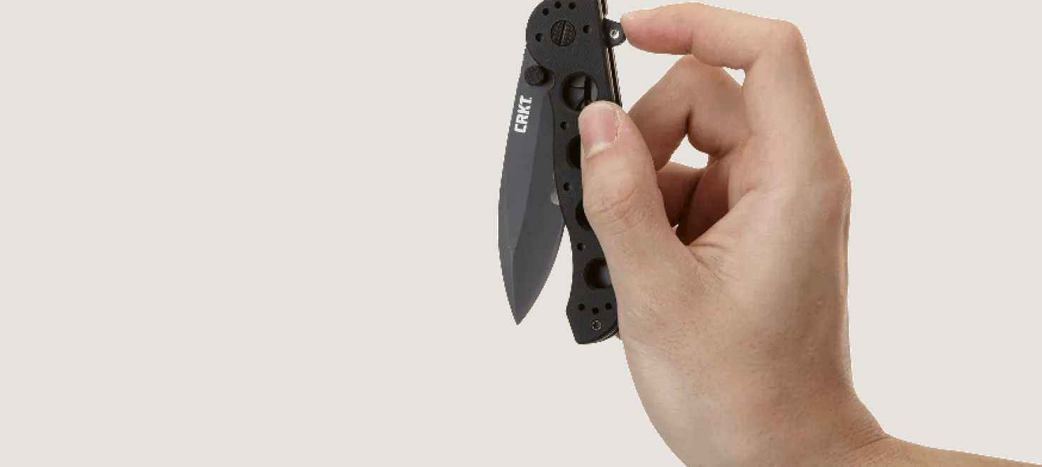 Couteau pliant CRKT M21 manche à trous G10 noir
