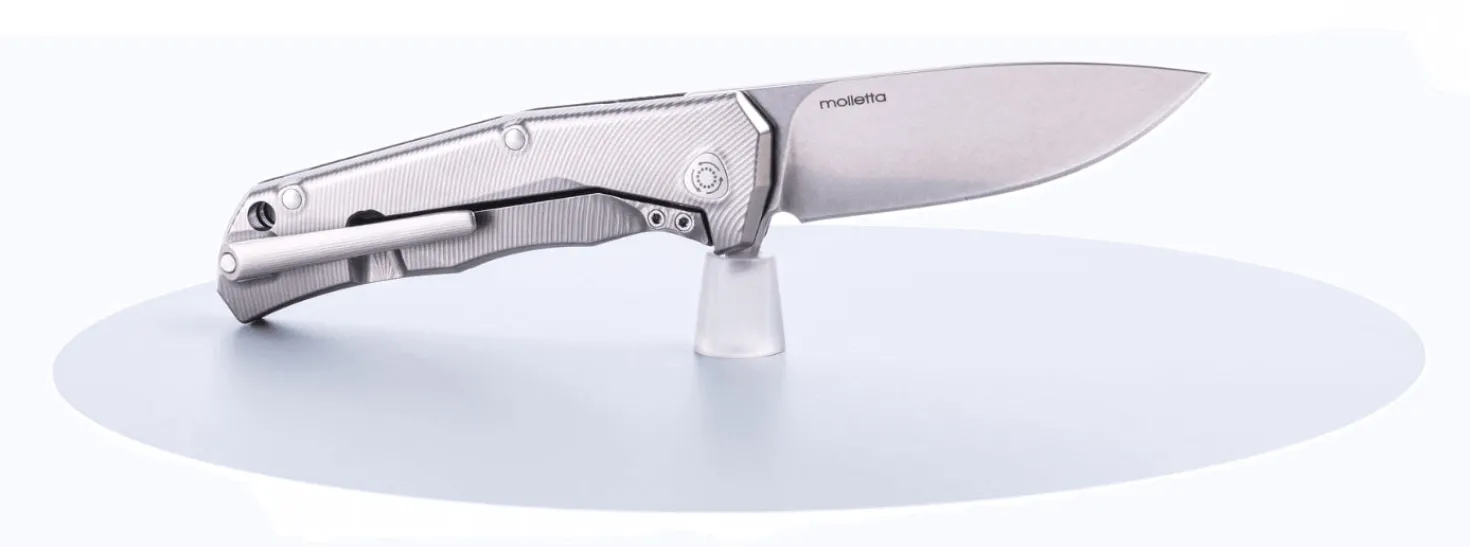 Couteau pliant LionSteel Tre manche G10 / titanium 10cm
