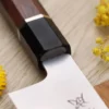 Couteau santoku 19,5cm japonais artisanal Sukenari SG2 San Maï manche en bois de rose