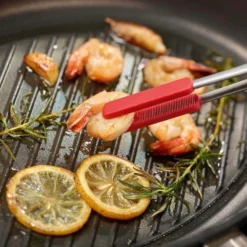 Grande pince de cuisine Triangle inox embouts silicone amovibles
