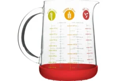 Verre doseur Pebbly en verre borosilicate et base en silicone